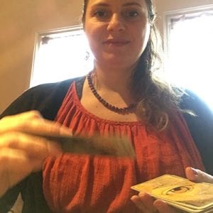 Courtney Carnrite with tarot cards